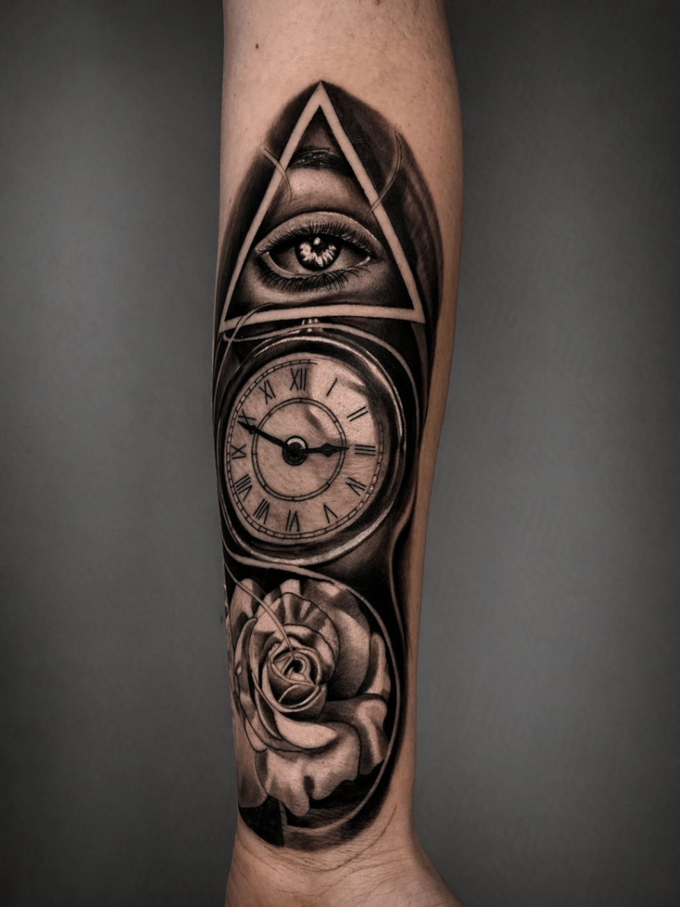 Black and grey eye, pocket watch and rose forearm tattoo by Rondon Neto