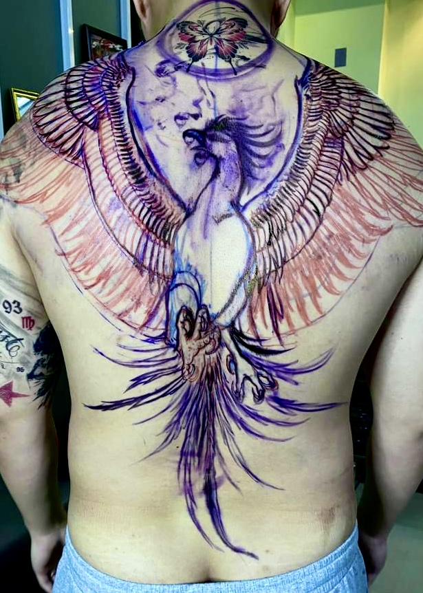 Freehand phoenix design drawn on the back